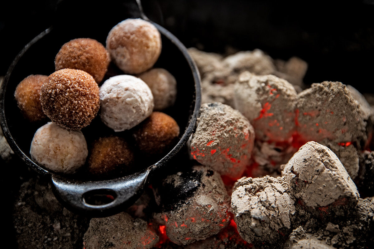 Omni Season of Smoke — smoked doughnut holes served over glowing coals