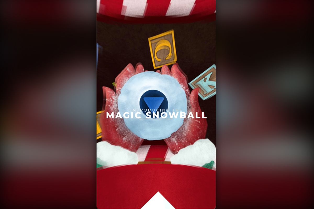 Magic Snowball reel still — “Introducing the Magic Snowball,” the snowball cradled in hands amid tinker-toy blocks